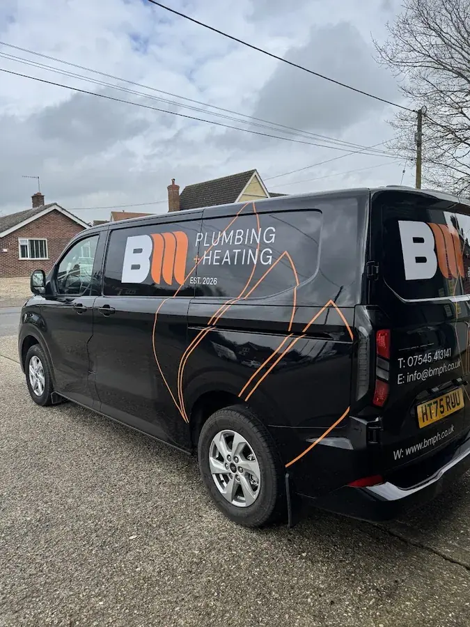 A BM Plumbing + Heating van wearing its new livery
