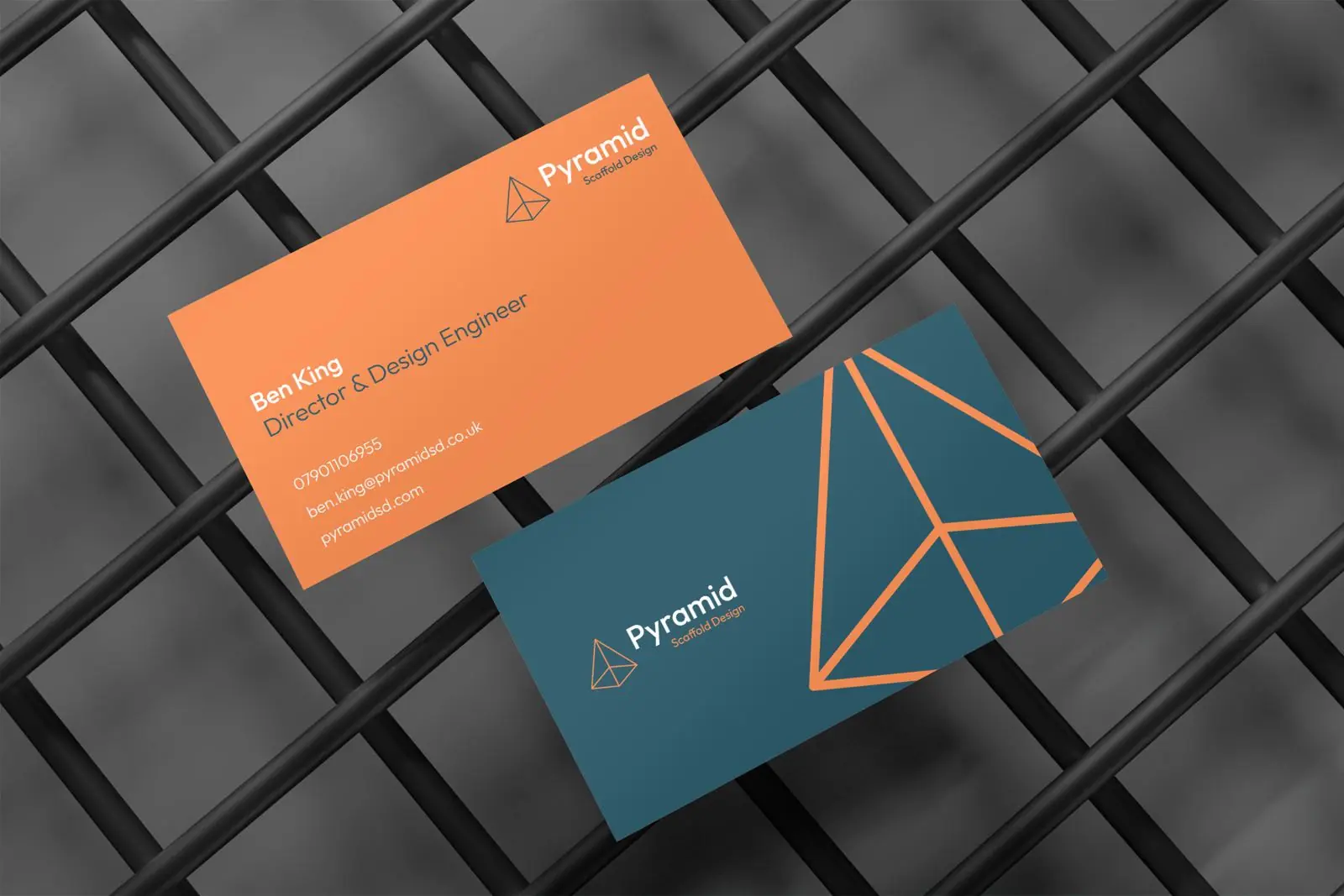 Pyramid SD business cards in teal and orange